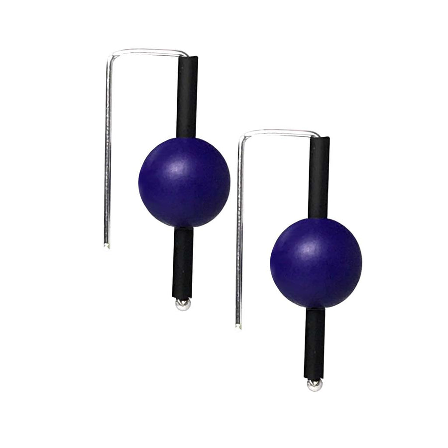Blue rubber earrings made with sterling silver. Bold, fun design.