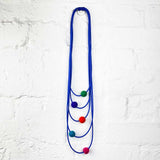 felt and  blue rubber necklace 5 strands